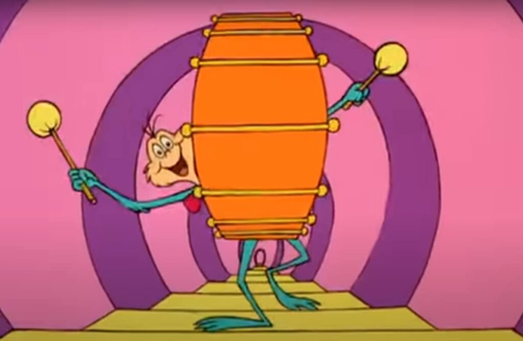 whoville child beating drum